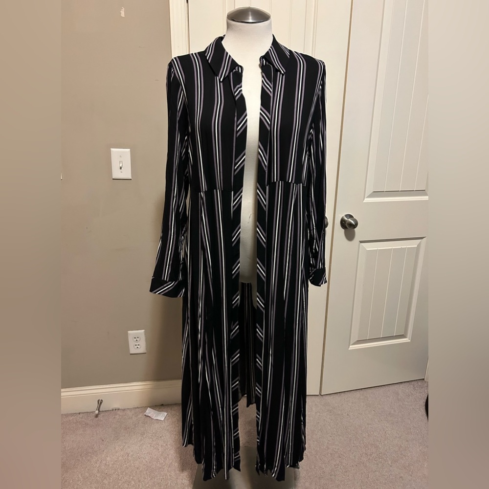 This purple black and white kimono or cover up is awesome.